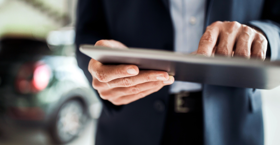 View Autotrader's step-by-step user guides A sales manager using a digital device