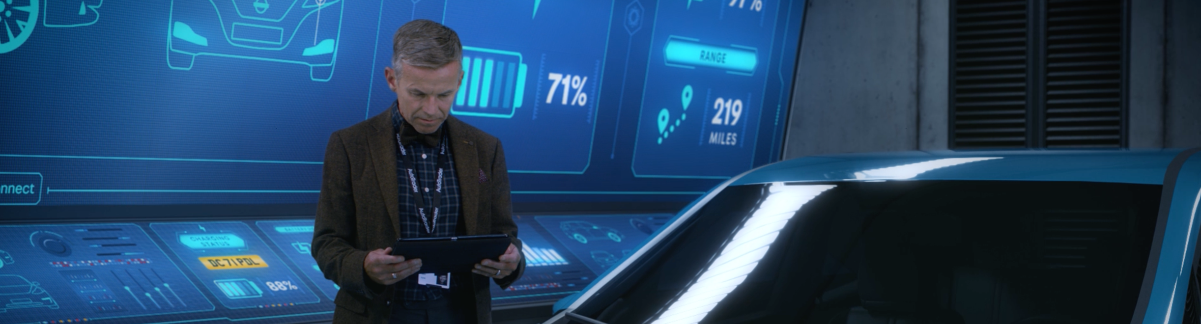 Autotrader's sourcing products put you in control A sales manager sat at a desk working on a laptop