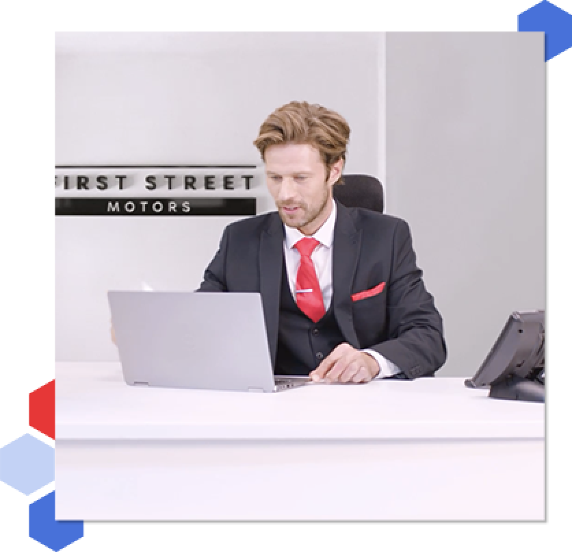 Build Consumer Trust A sales manager sat at a desk working on a laptop