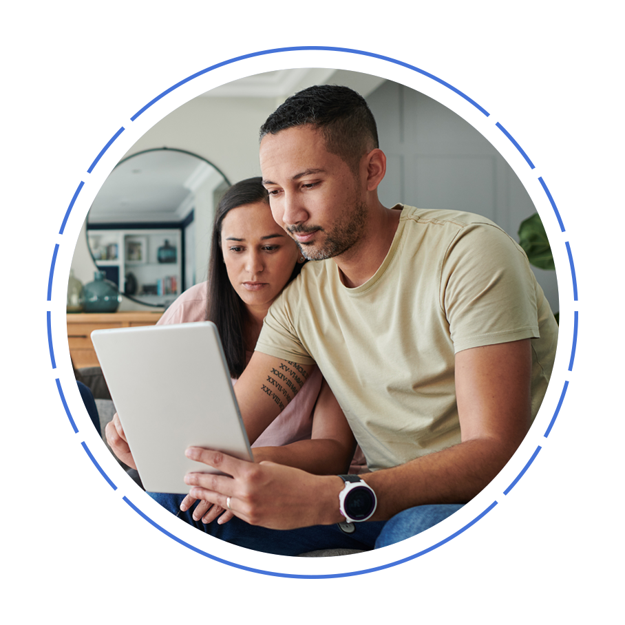 A couple looking at a tablet